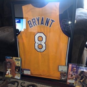 Autographed Kobe Bryant #8 jersey and rookie card